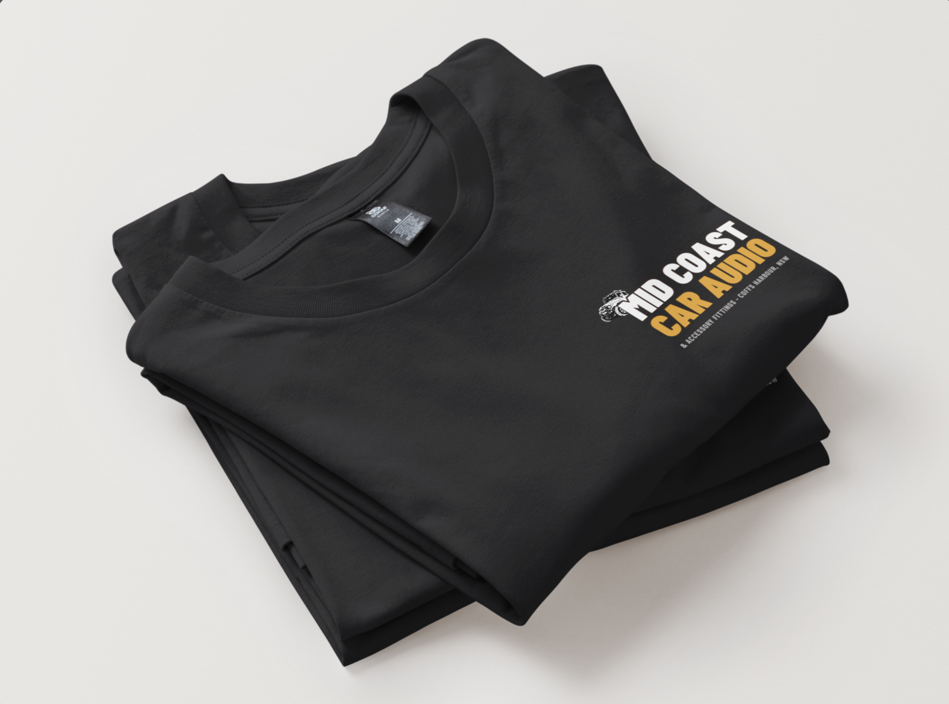 Folded MidCoast Car Audio t-shirts